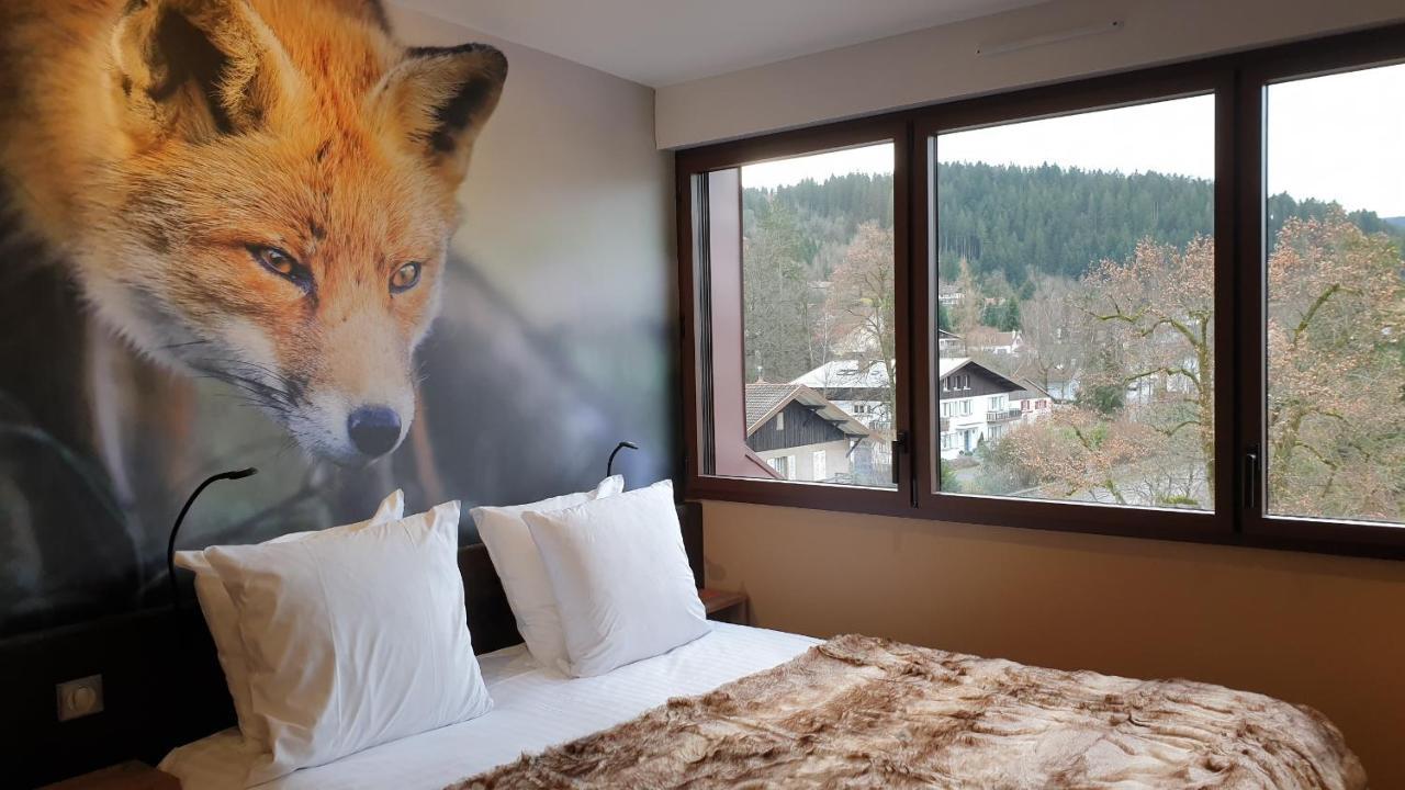 Les Loges Du Parc Hotel Gerardmer Bagian luar foto